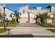 Two-story townhome with attached garage and landscaping at 781 Ocean Course Ave # 601, Davenport, FL 33896