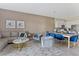 Open living and dining area with contemporary furnishings at 781 Ocean Course Ave # 601, Davenport, FL 33896