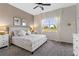 Spacious main bedroom with king-size bed and large window at 781 Ocean Course Ave # 601, Davenport, FL 33896