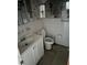 Bathroom with white tile and vanity at 1918 Mountain Lake Cutoff Rd, Lake Wales, FL 33859