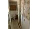 Bathroom with shower, toilet and damaged walls at 1918 Mountain Lake Cutoff Rd, Lake Wales, FL 33859