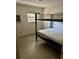 Bedroom with bunk bed and window at 1918 Mountain Lake Cutoff Rd, Lake Wales, FL 33859