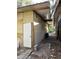 Unfinished exterior shed with metal roof and door at 1918 Mountain Lake Cutoff Rd, Lake Wales, FL 33859
