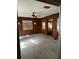 Florida room with wood paneling and window at 1918 Mountain Lake Cutoff Rd, Lake Wales, FL 33859