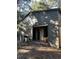 Large metal garage with roll-up door and side door at 1918 Mountain Lake Cutoff Rd, Lake Wales, FL 33859