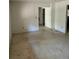 Spacious living room with light-colored flooring at 1918 Mountain Lake Cutoff Rd, Lake Wales, FL 33859