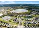 High angle view of single Gathering houses with a lake at 2213 Grantham Ave, Davenport, FL 33837