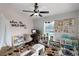 bedroom or playroom with colorful rug, toys, and educational wall decor at 2213 Grantham Ave, Davenport, FL 33837