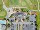 Aerial view of the community clubhouse, pool, and golf course at 2213 Grantham Ave, Davenport, FL 33837
