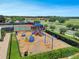 Community playground with swings, slides, and climbing structures at 2213 Grantham Ave, Davenport, FL 33837