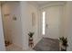 Bright and airy entryway with tile flooring and coat closet at 2393 Jernigan Loop, Kissimmee, FL 34746