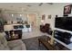 Open concept kitchen features island with seating and modern appliances at 2393 Jernigan Loop, Kissimmee, FL 34746