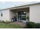 Brick patio with seating area, grill, and sliding glass door access at 2393 Jernigan Loop, Kissimmee, FL 34746