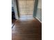 Bright dining area with hardwood floors and access to backyard at 2680 Palmetto Rd, Mount Dora, FL 32757