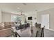 Dining area with table and chairs near living room at 3780 Plainview Dr, Orlando, FL 32824
