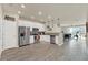 Modern kitchen with stainless steel appliances and white cabinetry at 3780 Plainview Dr, Orlando, FL 32824