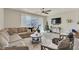 Living room with sectional sofa and Christmas tree at 3780 Plainview Dr, Orlando, FL 32824