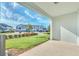Covered patio overlooking community green space at 3780 Plainview Dr, Orlando, FL 32824