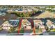 Aerial view of a two-story house and surrounding neighborhood at 488 Sapphire Dr, Davenport, FL 33837