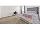 Bedroom featuring a bed, small desk, and window with natural light at 488 Sapphire Dr, Davenport, FL 33837