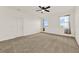 Bright bedroom with carpet and ceiling fan at 488 Sapphire Dr, Davenport, FL 33837
