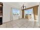Bright dining room with tile floors and large windows at 488 Sapphire Dr, Davenport, FL 33837