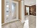 Bright entryway with tiled floors and an interior door at 488 Sapphire Dr, Davenport, FL 33837