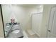 Modern bathroom with double sinks, granite countertop, and a shower at 811 Turner Ln, Winter Haven, FL 33881