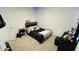 Bedroom with carpeted floor, a bed, and a vanity at 811 Turner Ln, Winter Haven, FL 33881