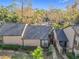 Aerial view of a community of tan stucco houses at 940 Douglas Ave # 217, Altamonte Springs, FL 32714