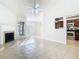 Spacious living room with fireplace and tile floors at 940 Douglas Ave # 217, Altamonte Springs, FL 32714