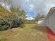 Spacious, grassy backyard with a few trees at 3258 Cranston St, Deltona, FL 32738