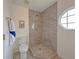 Bathroom with a tiled walk-in shower and modern fixtures at 3258 Cranston St, Deltona, FL 32738