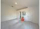 Large, carpeted bedroom with ensuite bathroom access at 3258 Cranston St, Deltona, FL 32738