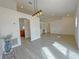 Open dining area with wood-look flooring and an adjacent kitchen at 3258 Cranston St, Deltona, FL 32738