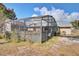 Screened patio area adjacent to the pool at 1561 Ohara St, Deltona, FL 32725