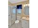 Bathroom with shower, toilet and vanity with white countertop at 310 Stonington Way, Deland, FL 32724