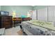 Guest bedroom with wooden furniture and a TV at 3528 Chapel Hill Blvd, Clermont, FL 34711