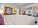 Comfortable bedroom with a king-size bed and views into another bedroom at 3528 Chapel Hill Blvd, Clermont, FL 34711