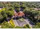 Gated entrance to community with lush landscaping and fountain at 3528 Chapel Hill Blvd, Clermont, FL 34711