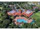 Community pool with lounge chairs and surrounding landscape at 3528 Chapel Hill Blvd, Clermont, FL 34711