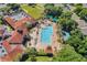 Aerial view of resort-style community pool with many people at 3528 Chapel Hill Blvd, Clermont, FL 34711