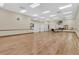 Large community room with hardwood floors at 3528 Chapel Hill Blvd, Clermont, FL 34711