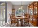 Traditional dining room with wooden table and hutch at 3528 Chapel Hill Blvd, Clermont, FL 34711