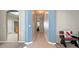 Bright hallway with light blue walls and tile flooring at 3528 Chapel Hill Blvd, Clermont, FL 34711