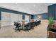 Modern meeting room with large table and chairs at 3528 Chapel Hill Blvd, Clermont, FL 34711