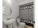 Clean bathroom with pedestal sink and shower/tub combo at 5255 Images Cir # 306, Kissimmee, FL 34746