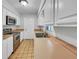 Clean kitchen with stainless steel appliances and light-colored cabinetry at 7008 Watseka Ave, Orlando, FL 32818
