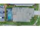 Top-down view of house with pool and parking at 8100 Fan Palm Way, Kissimmee, FL 34747