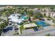 Aerial view of community amenities including pool, basketball court, and playground at 8100 Fan Palm Way, Kissimmee, FL 34747
